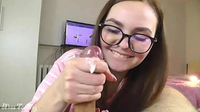 Sweet girl in glasses gives blowjob and handjob with plenty of cum