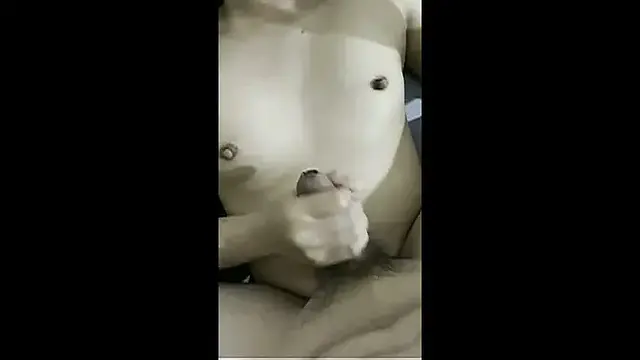 Sweet Asian girlfriend gives handjob to boyfriend