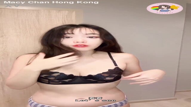 Hot young woman in black dress tempts viewers in first scene of new year